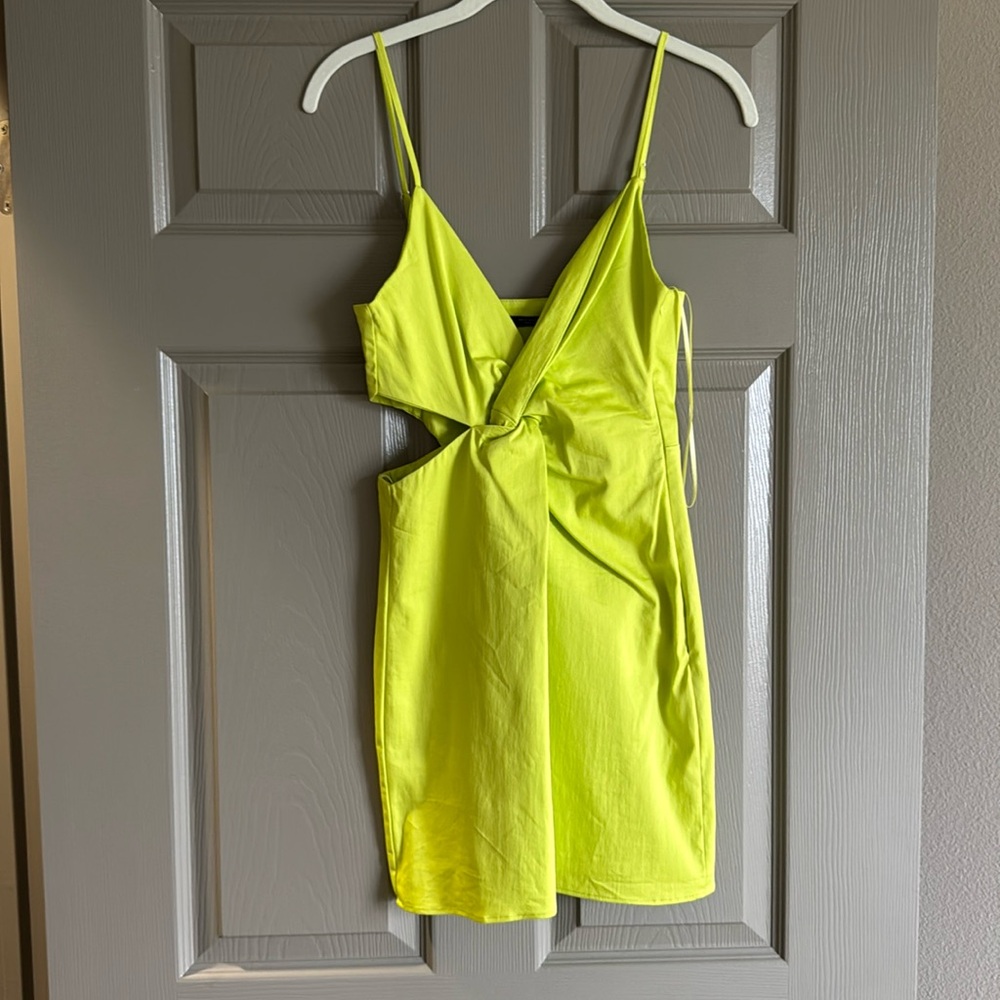 lime green twist front dress. zipper on the side, adjustable straps.